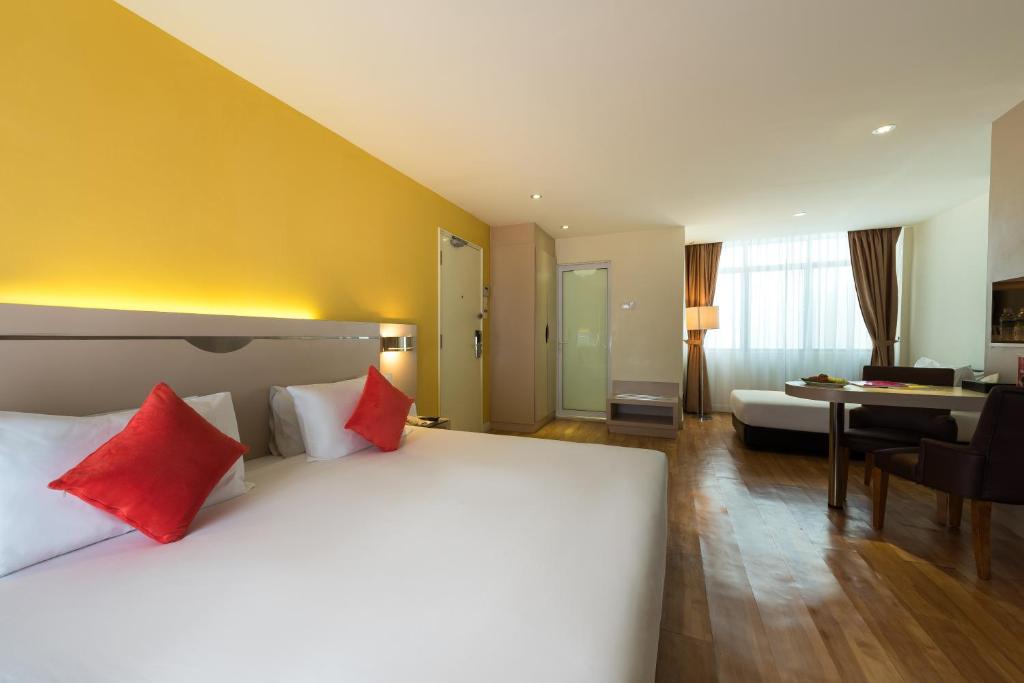 Postel nebo postele na pokoji v ubytování Hotel Sentral Georgetown @ City Centre