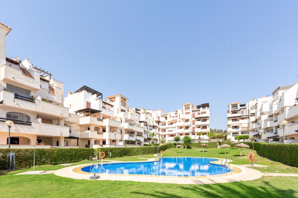 an image of an apartment complex with a swimming pool at Apartamento increible Playazo Vera in Vera