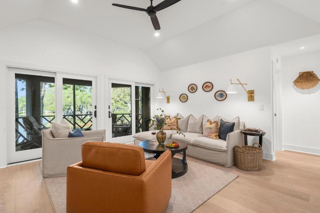 a living room with a couch and a table at 4826 Green Dolphin Way in Kiawah Island