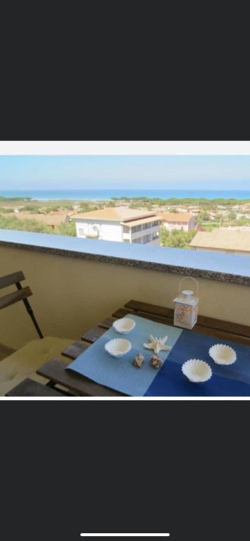 a view of a balcony with cookies on a table at Casa Vacanza Sa Petra Ruja B in Siniscola