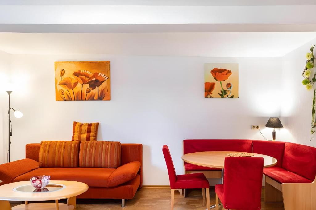 a living room with a couch and a table at Fewo Edith in Gersfeld