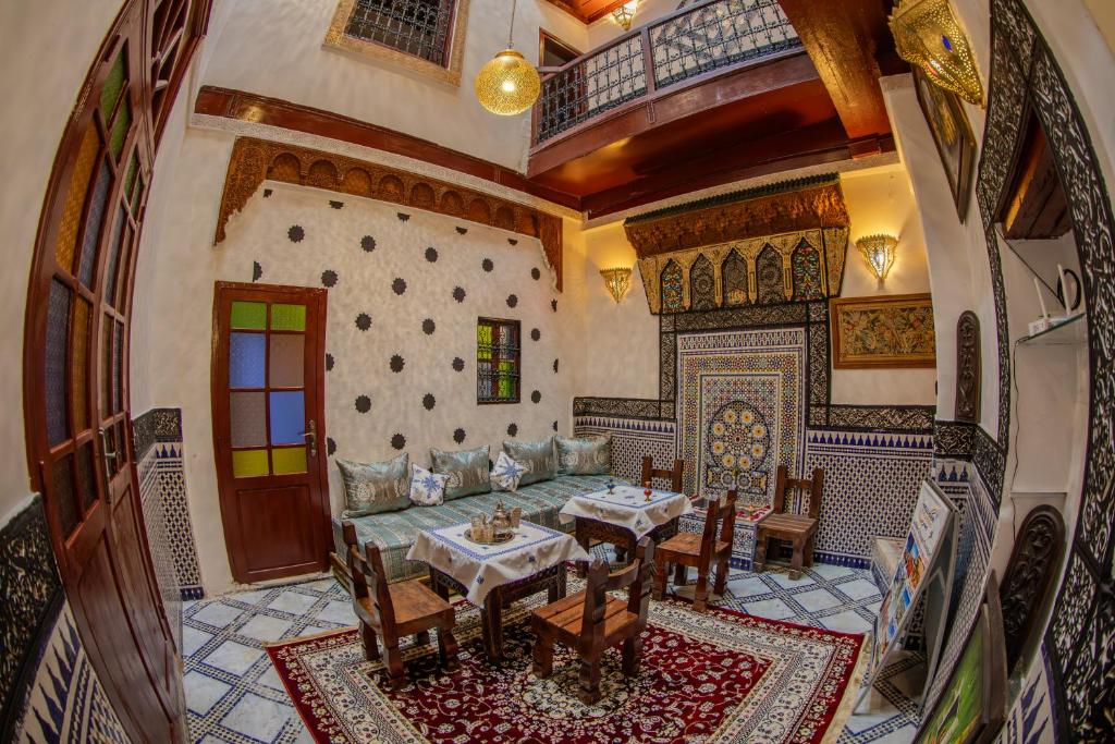 an overhead view of a living room with a table at Dar Chbili Fès in Fez