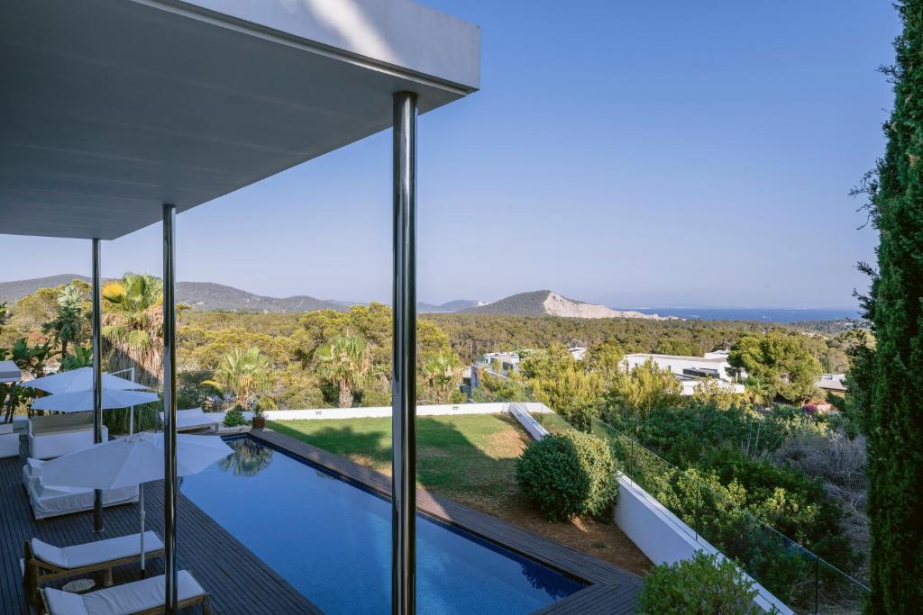 a view of the pool from the house at Villa 10 9 in Sant Josep