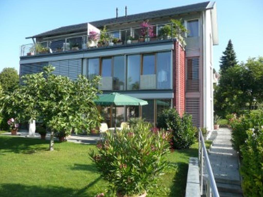 a large house with plants on top of it at Ferienwohnung Koch Thurgauer Weg in Reichenau