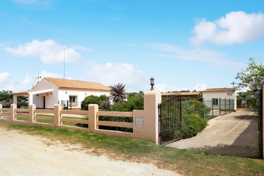 a fence in front of a house at Villa Perez Zara Carmelo in Campano