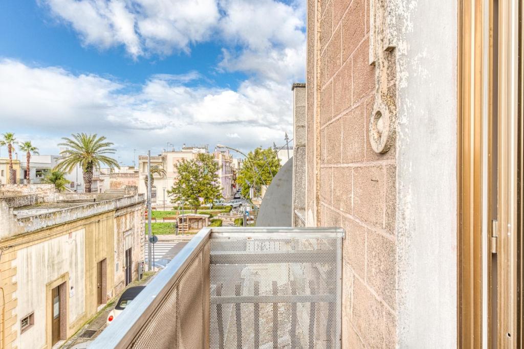 a balcony with a view of a city at Cod 278 al centro del paese in Ugento