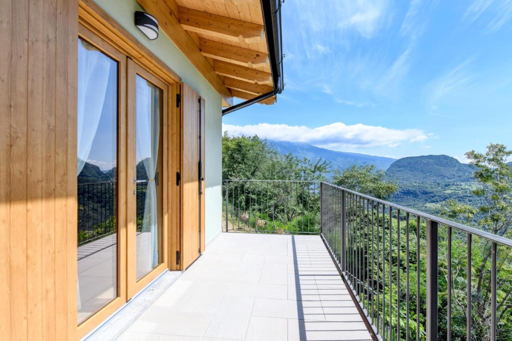 a balcony with a view of the mountains at Nonno Bigi Tulipano in Tremosine Sul Garda
