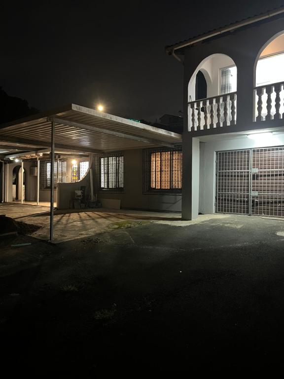 a house at night with the lights on at 85 Hidden Gem in Newlands