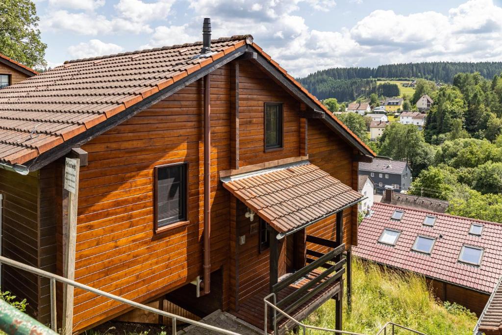 a log cabin with a roof at Sommerberg in Unterkirnach