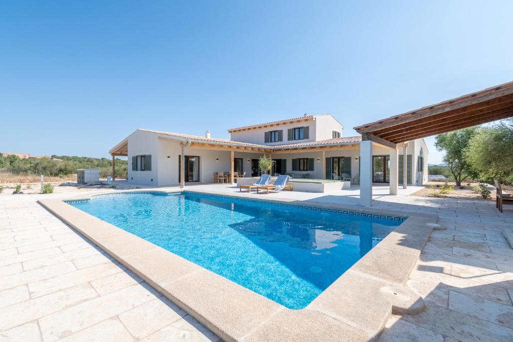 an image of a villa with a swimming pool at Villa Lorena in Islas Baleares