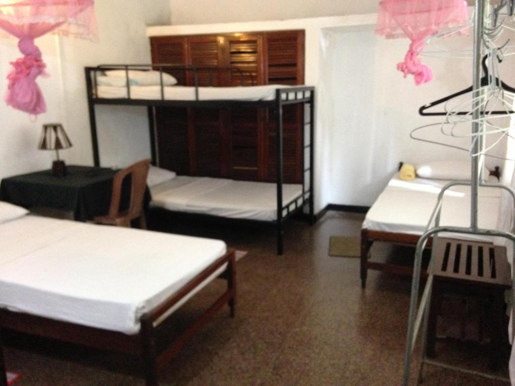 Postel nebo postele na pokoji v ubytování Drop Hostel