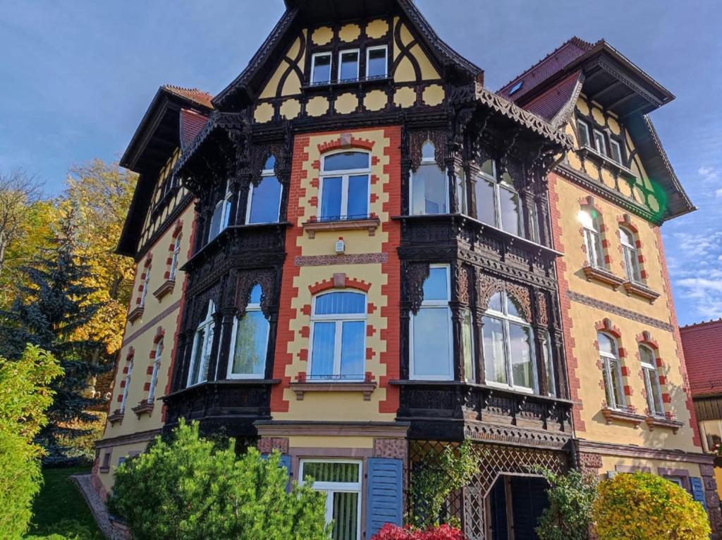 a tall building with many windows on top of it at Apartment in Villa Rochlitz in Rochlitz