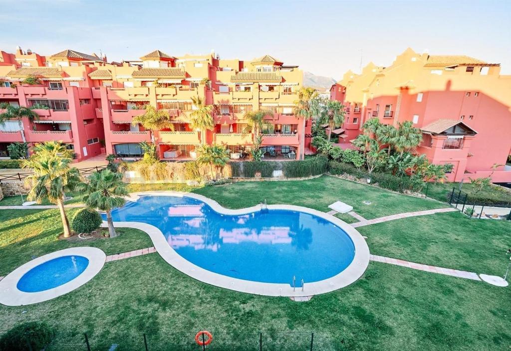 an aerial view of a resort with a swimming pool at Beautiful Penthouse in Torrox Costa