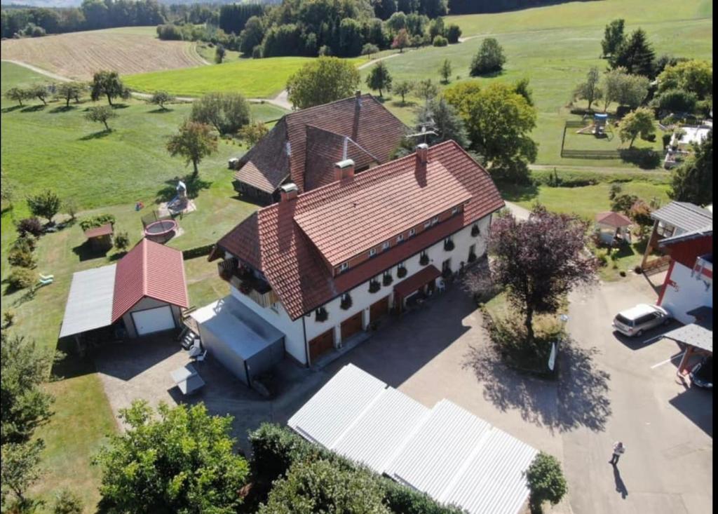 an overhead view of a large house with a roof at Haus Jehle in Görwihl