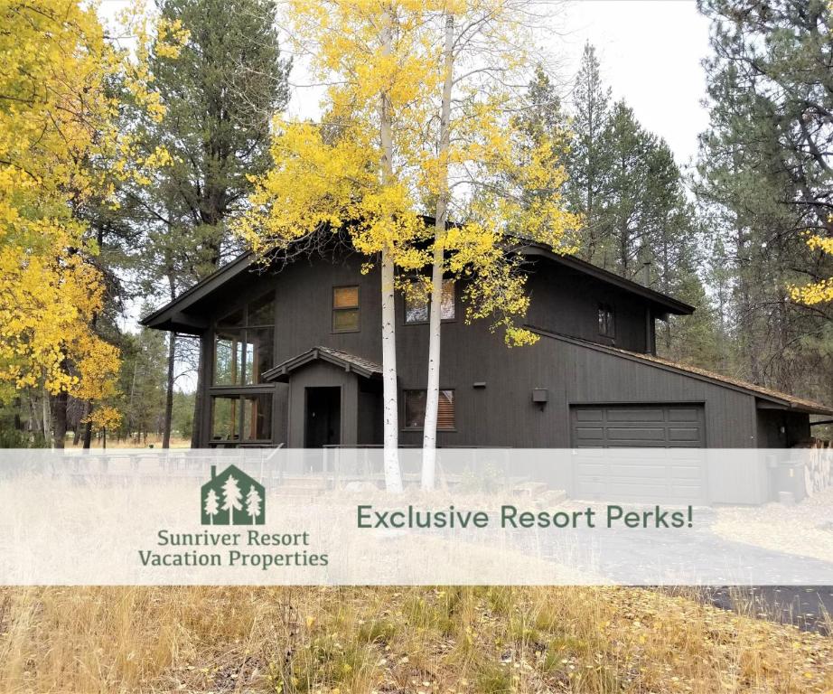 a house with a tree in front of it at 4 Spyglass Lane in Sunriver