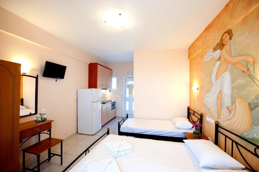 A bed or beds in a room at Effie's House