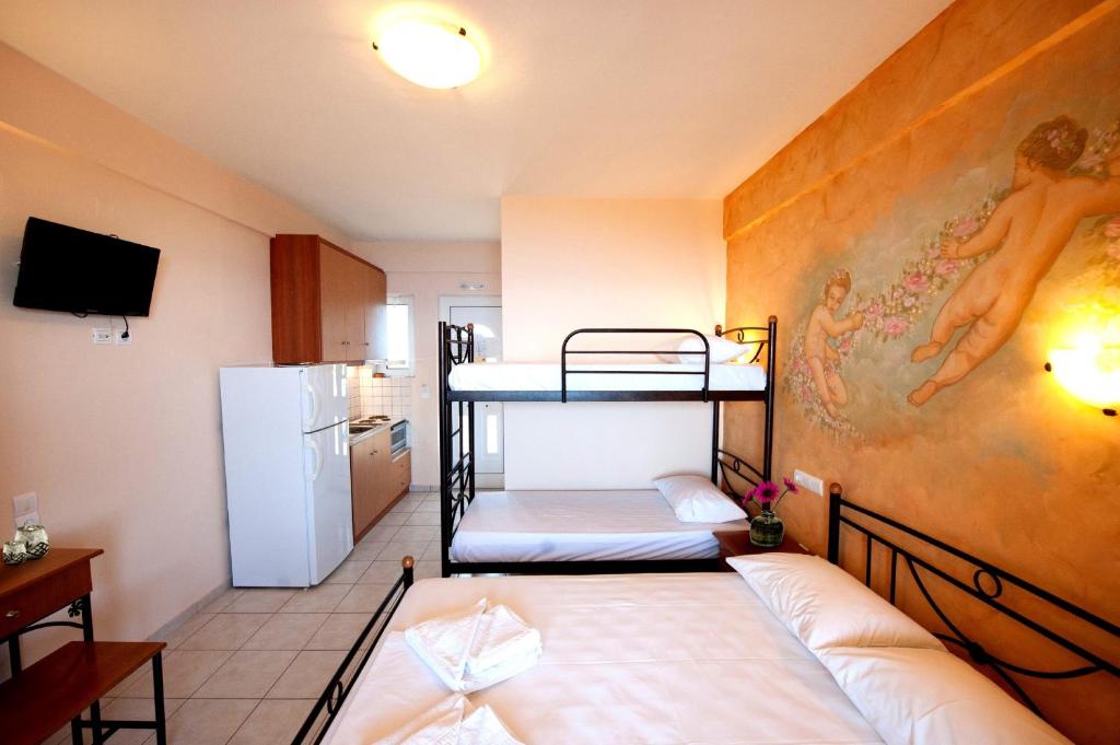 A bed or beds in a room at Effie's House