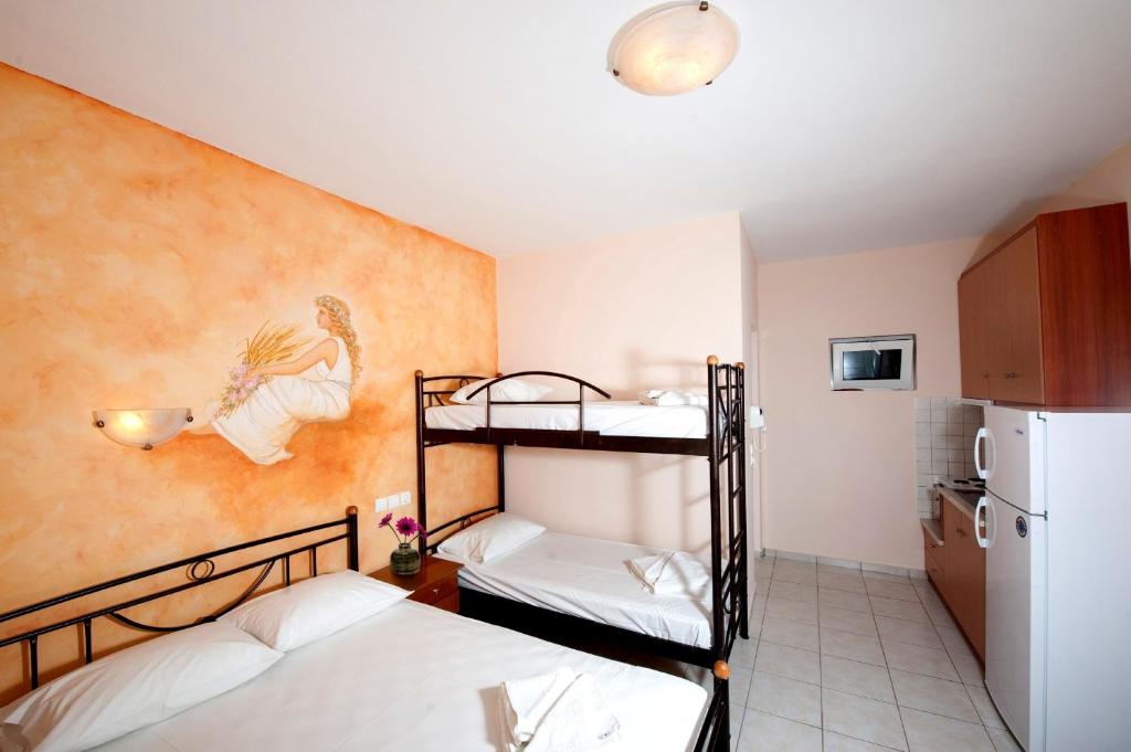 A bed or beds in a room at Effie's House
