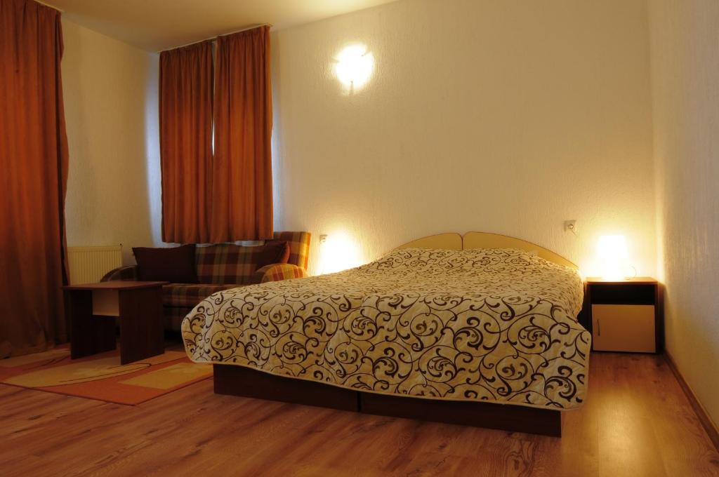 Postel nebo postele na pokoji v ubytování Michel Hotel