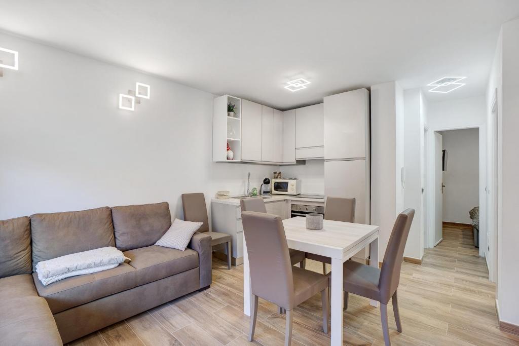 a living room with a couch and a table at Casa Gianpaolo in Piode