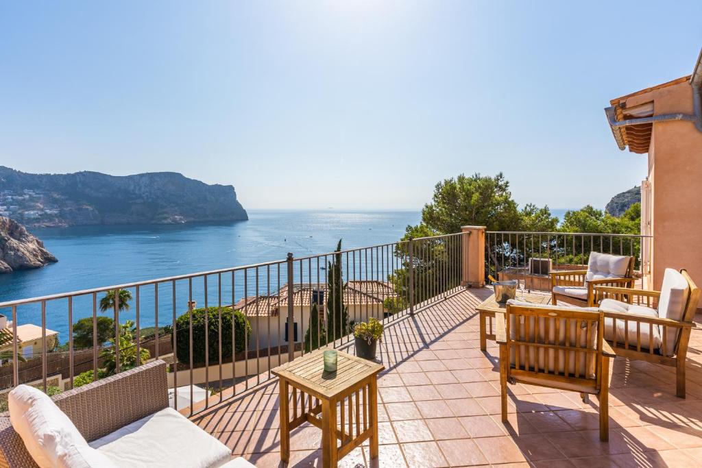 a balcony with a view of the ocean at Villa Almeda in Port d'Andratx