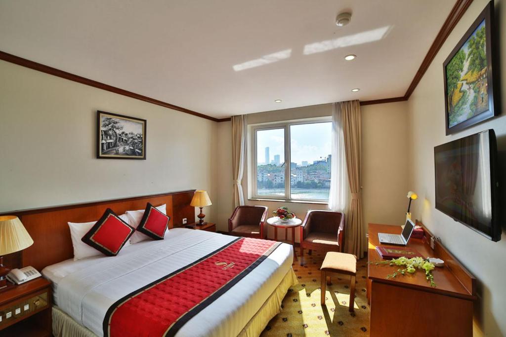 Postel nebo postele na pokoji v ubytování Sunny Hotel 1