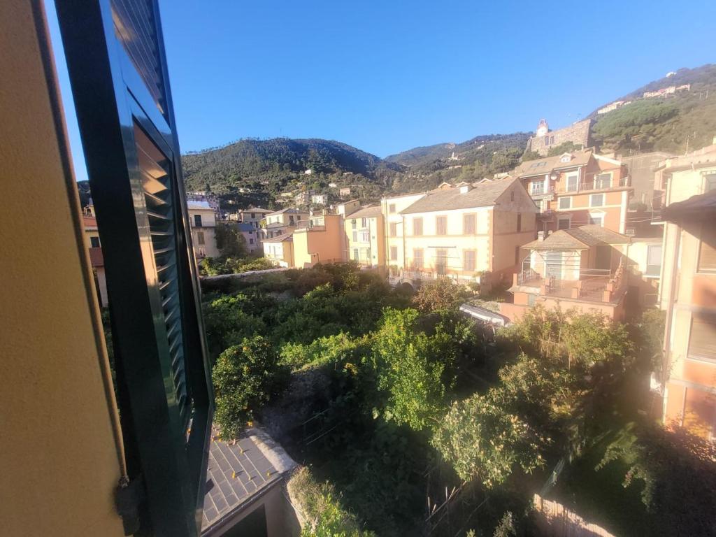 a view from a balcony of a city with buildings at Garibaldi vista Giardino in Bonassola