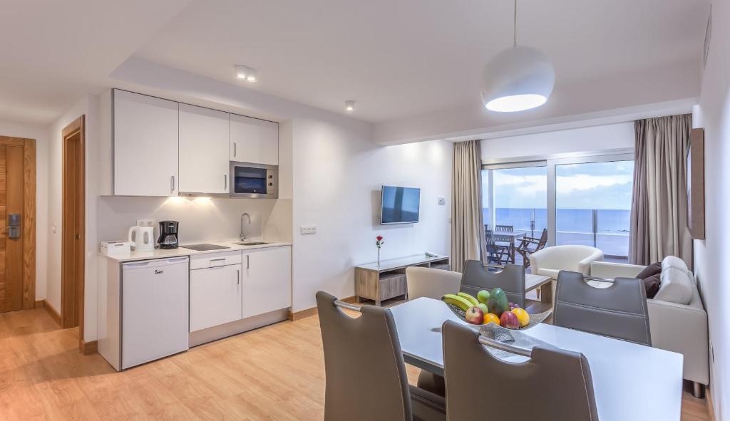 Kuchyň nebo kuchyňský kout v ubytování Hotel Lancelot