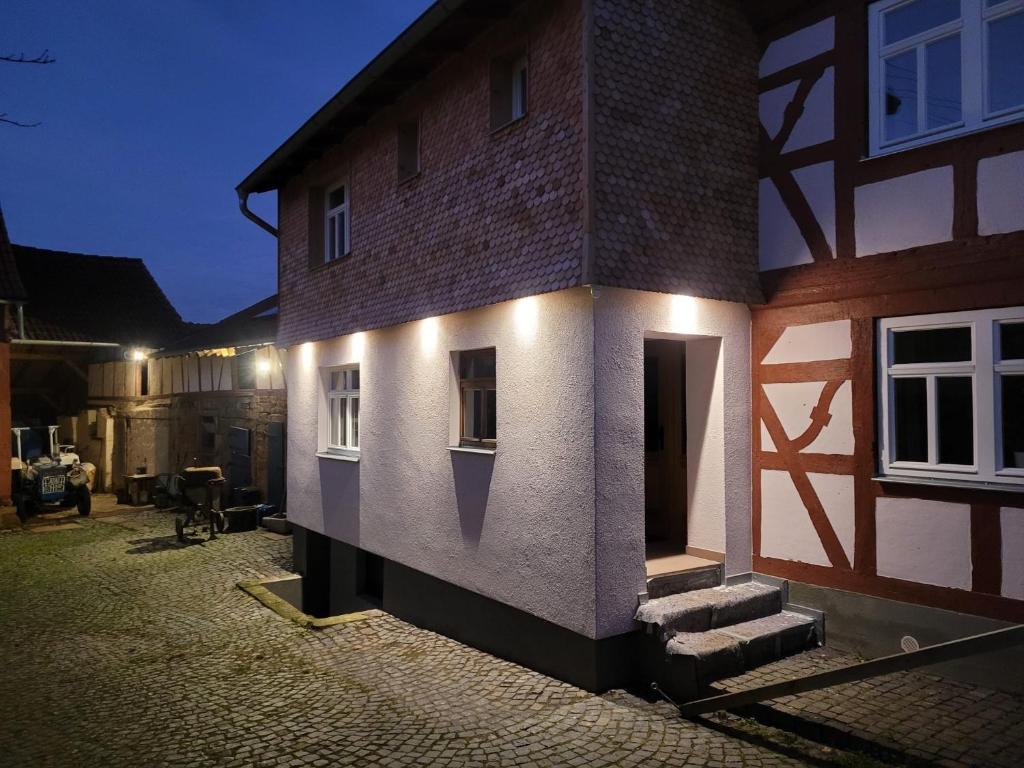 a building with lights on the side of it at Thum'scher Hof in Ortenberg