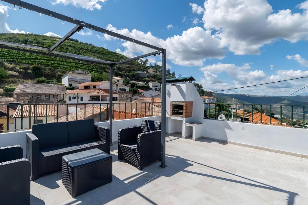 a view from the roof deck of a house at Casa Da Quelha in Armamar