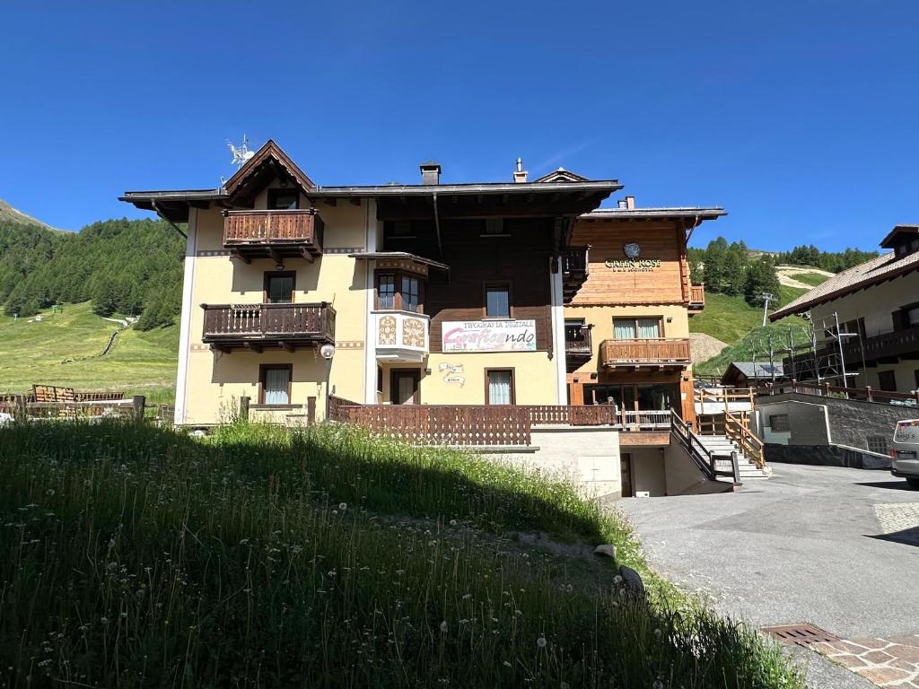 a building with balconies on the side of it at Villa Elma - Livigno in Livigno