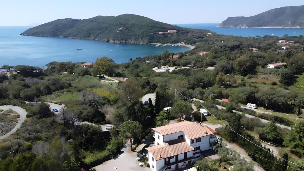 an aerial view of a house and a lake at Casa Golfi di Lacona in Lacona