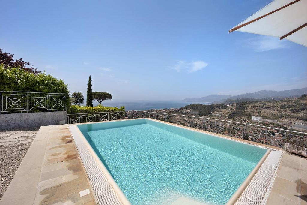 a swimming pool in a villa with a view at Villa Gaia in Bordighera