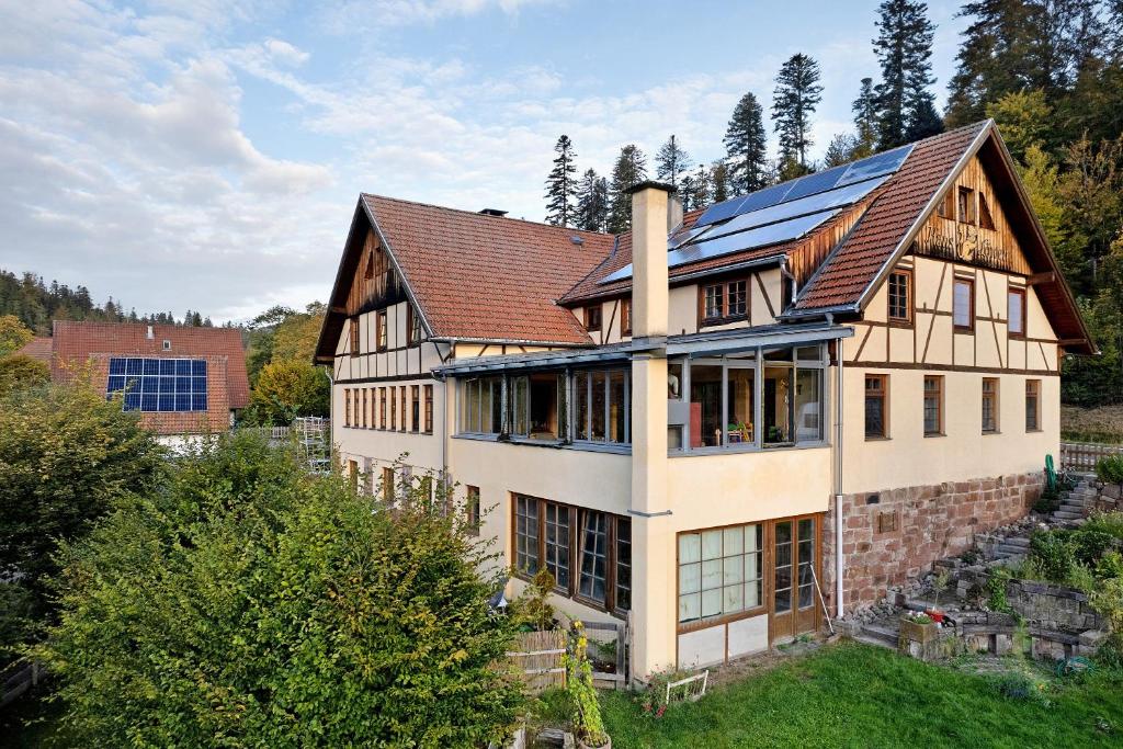 an image of a house with solar panels on it at Haus Löwen in Forbach