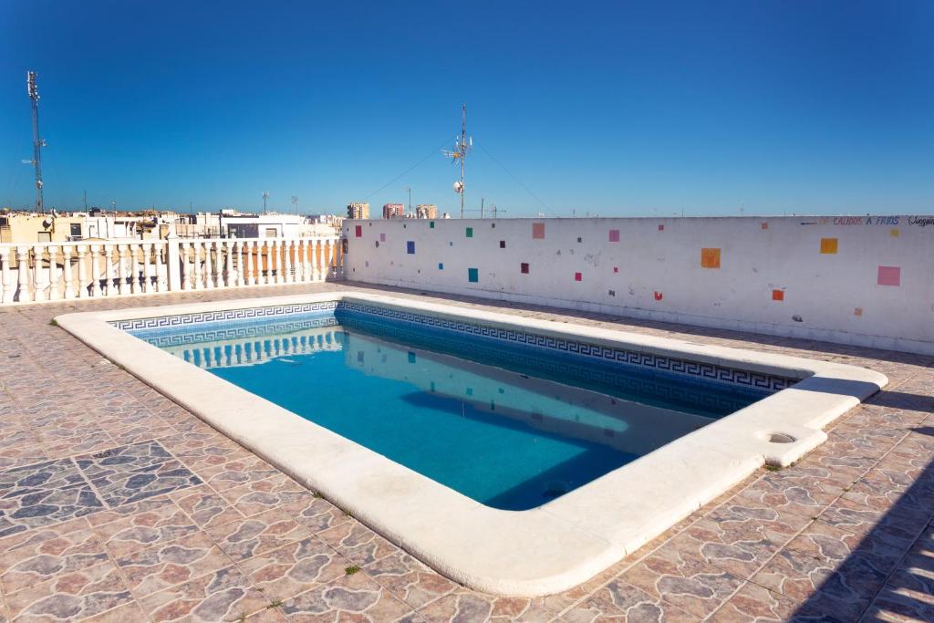a swimming pool on the side of a building at Navgts5p33-1 in Torrevieja