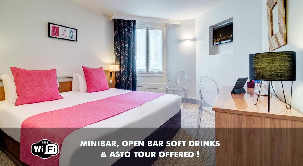a hotel room with a bed and a tv at Hotel Caumartin Op&eacute;ra - Astotel in Paris