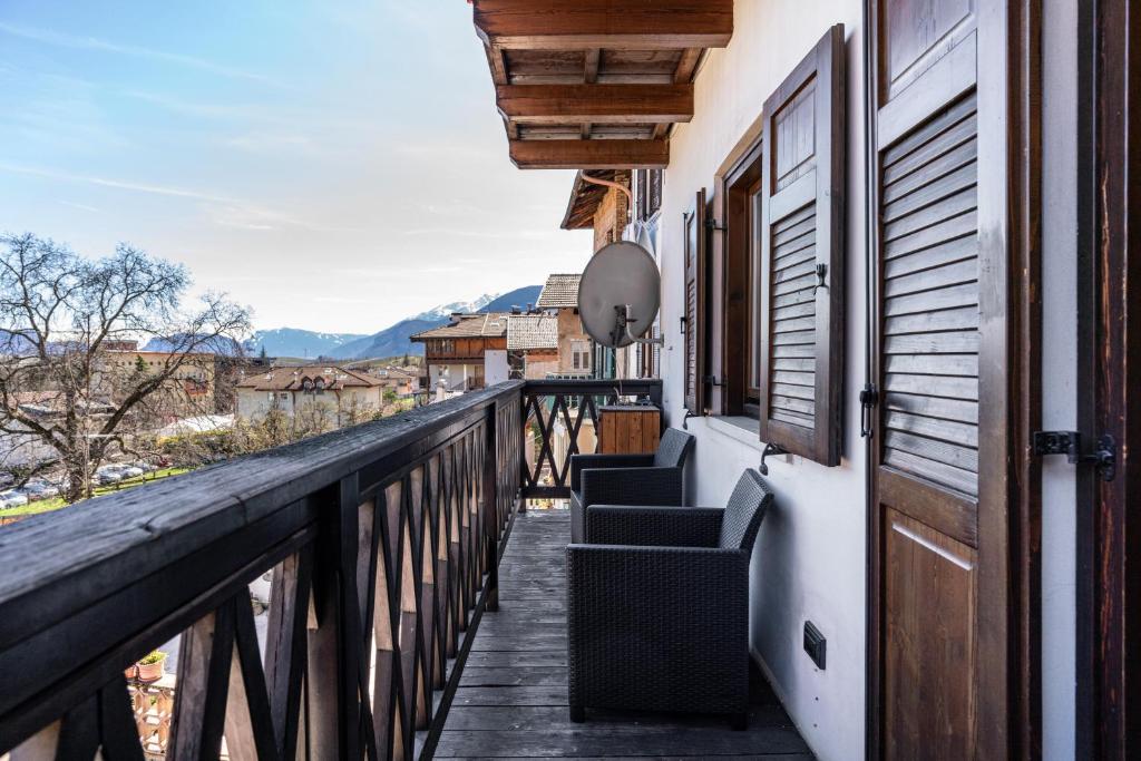 a balcony of a house with a view at Appartamento Cles in Cles