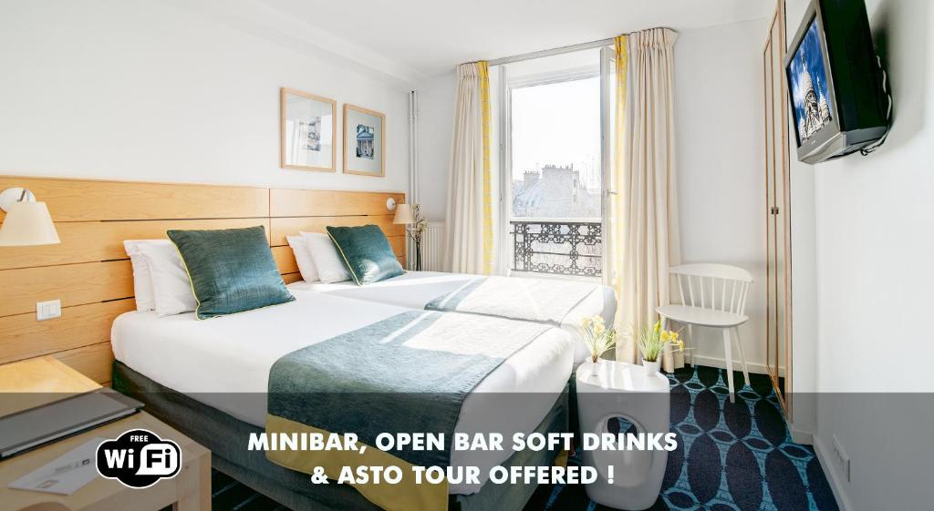 a hotel room with a bed and a window at Hotel Lorette - Astotel in Paris