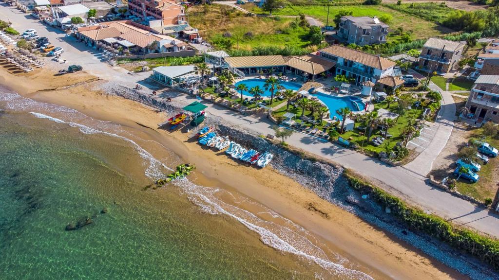 an aerial view of a resort and the beach at Mirage Arillas Villa Apartment in Arillas