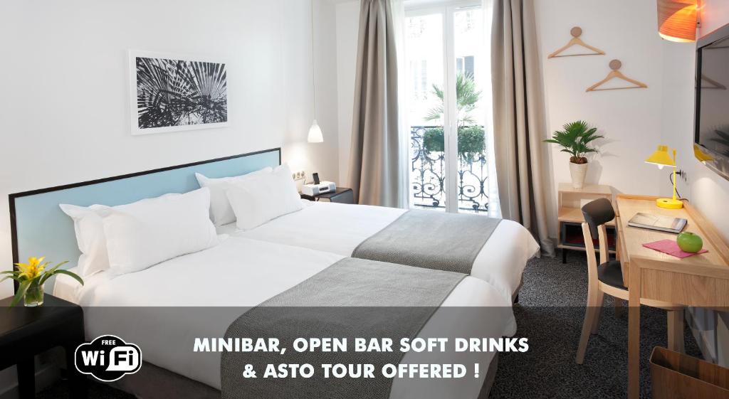 a hotel room with a bed and a desk and a bed and a bed at Hotel Palm - Astotel in Paris