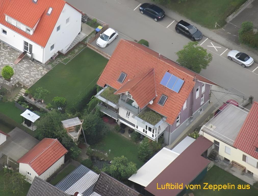an overhead view of a house with red roofs at Ferienwohnung Stine in Stetten