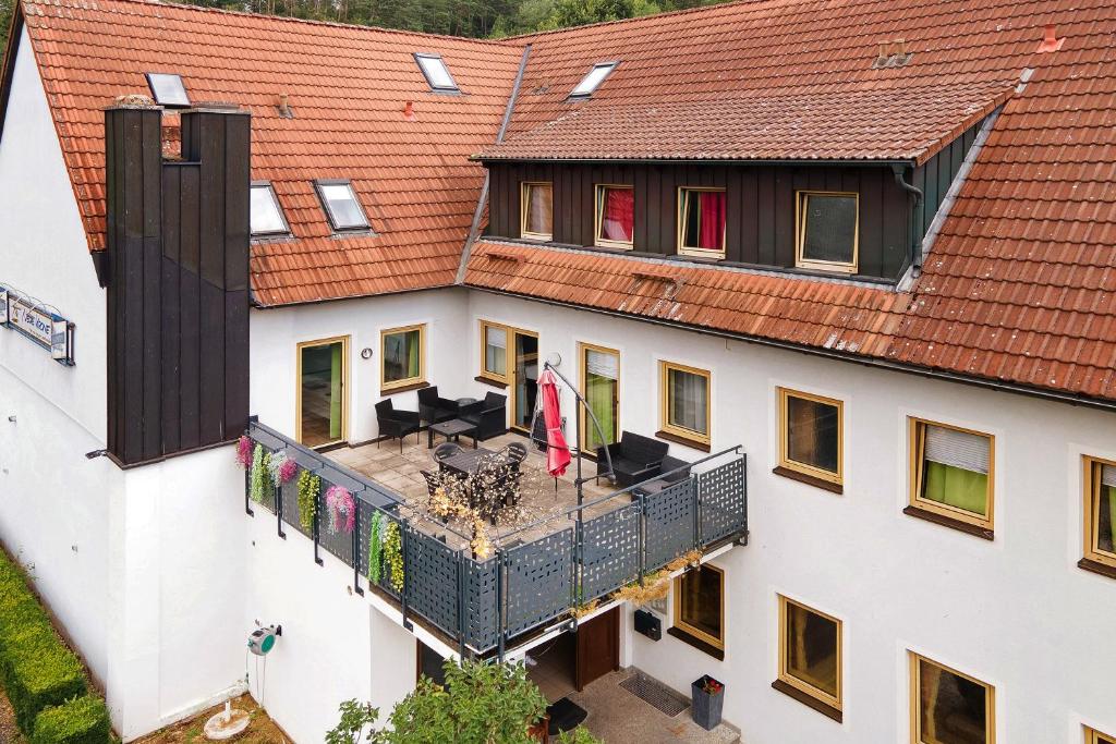 an aerial view of a building with a balcony at Hotel Neue Krone - Markt Erlbach in Markt Erlbach