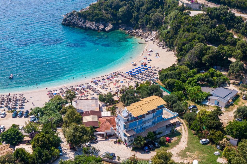 an aerial view of a beach with a resort at Alex bar apartments in Parga