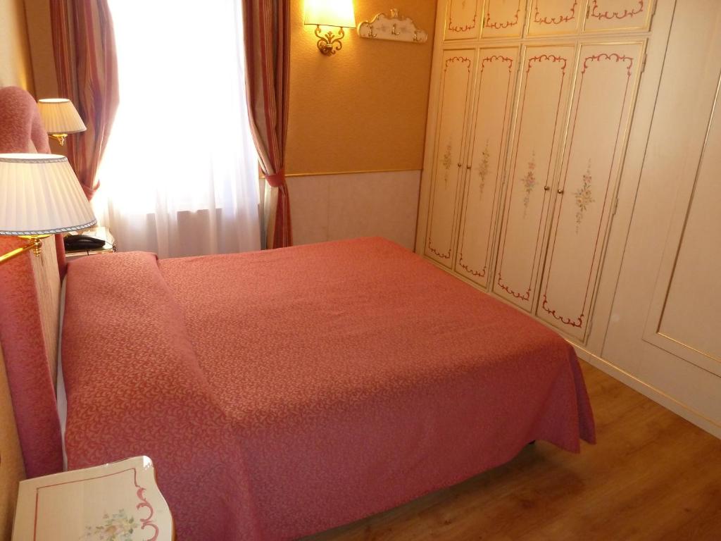 Postel nebo postele na pokoji v ubytování Casa Burchielle