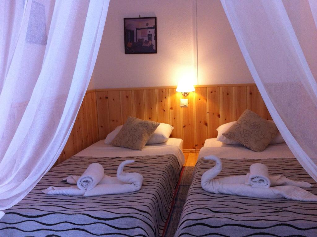 Postel nebo postele na pokoji v ubytování Villa Soultana
