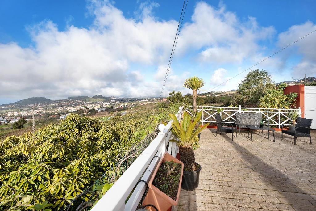 a balcony of a house with plants on it at Casa Andrea in Tacoronte