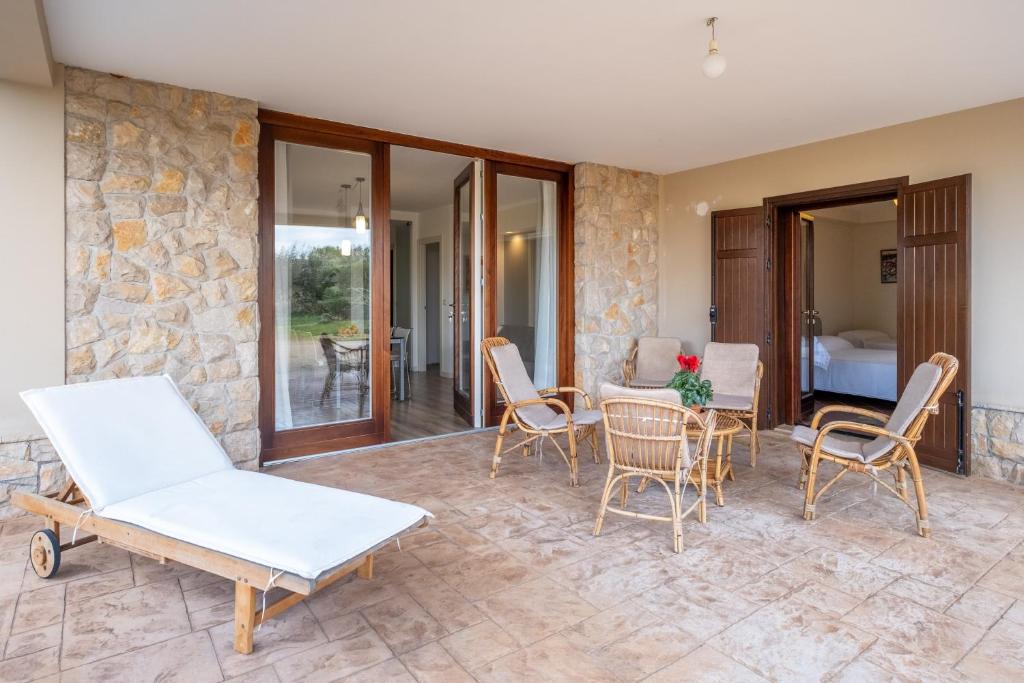 a living room with a table and chairs at Casa Cenate in Nardò