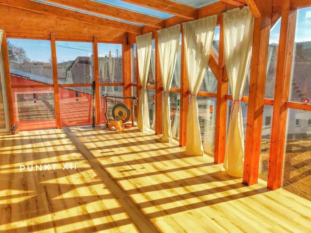 a room with windows in a house under construction at Wohnung 1 in Burghaslach