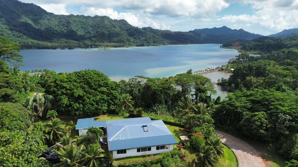 an aerial view of a house next to a lake at Grand Panorama Villa in Tahaa