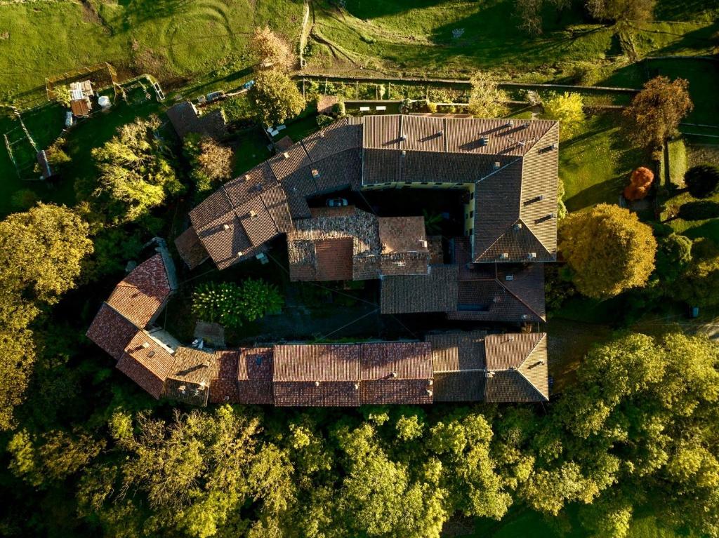 an overhead view of a house with a roof at Workation Castle in Carlazzo